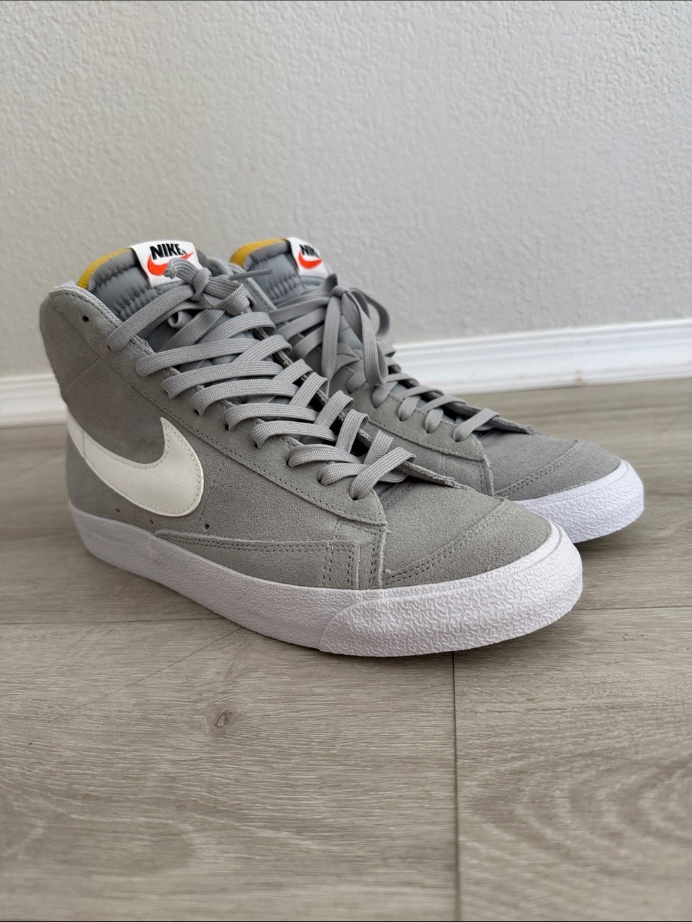 Nike Grey Suede High-Top Sneakers with White Swoosh and Yellow Trim